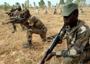 Soldiers kneeling