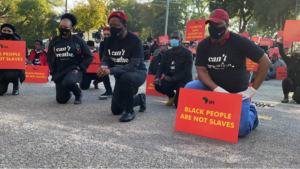 Credit-Members of the Economic Freedom Fighters political party state a protest outside the US Embassy in Pretoria- South Africa following Police killing of George Floyd