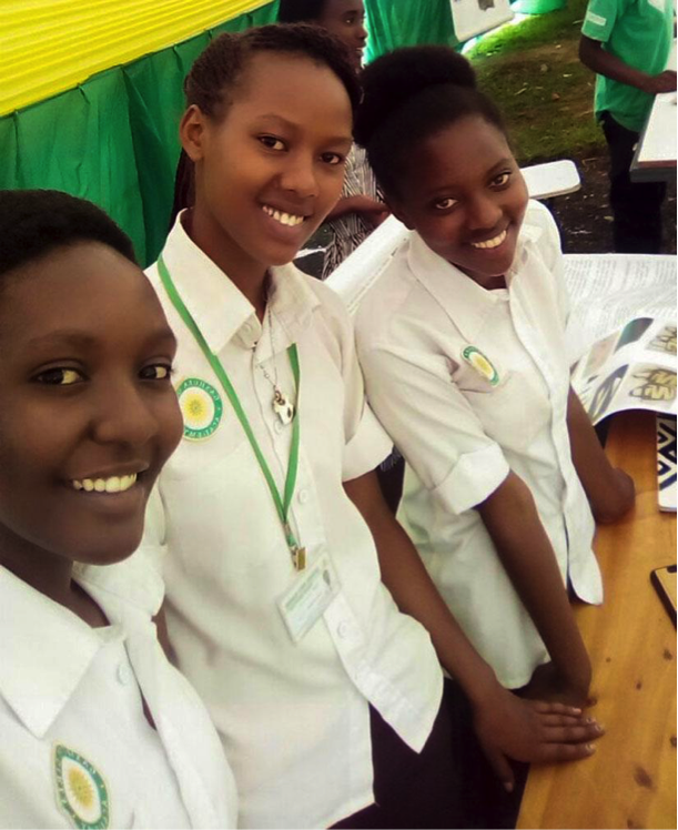 Rwandan girls pose for a photo during the last Made in Rwanda Expo in Gikondo. Credit: The New York Times