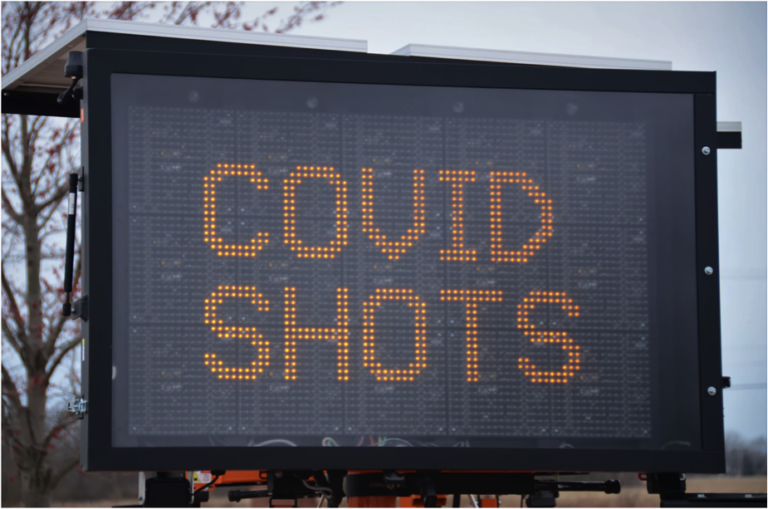COVID shots sign
